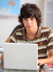 A student working on a laptop